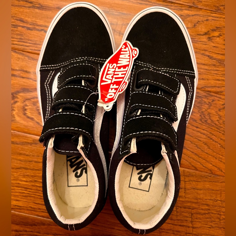 Size 4.5 M (6 W) NWT Vans Sk8 Lo. Black and white Velcro for easy on and off.